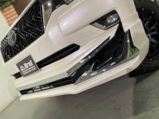 トヨタ ランドクルーザー プラド TX Lパッケージ 道北・旭川 2017(平29)年 2.5万km ホワイトパールクリスタルシャイン 【2405032058】/アルパイン9インチナビ（社外）/クルーズコントロール/前席シートヒーター/ベンチレーター/ETC/オートハイビーム/ヘッドライトウォッシャー/センターデフロック/コーナーセンサー/純正フロアマット/純正ドアバイザー/7人乗り/20AW ナイトロパワー  H6スラッグ（社外）/レーダー　レネゲードR/T＋（社外）/ボンネットエンブレム/社外パーツ取り付けあり。
