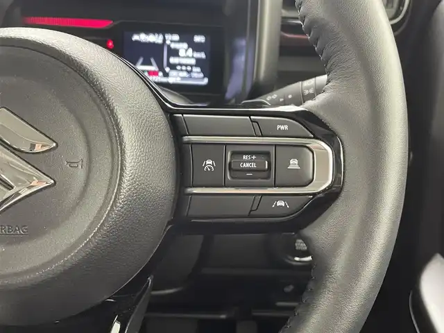 スズキ スペーシア カスタム HYBRID XS ターボ 熊本県 2024(令6)年 1.2万km ピュアホワイトP 禁煙車　/純正ナビ（ＡｐｐｌＣａｒＰｌａｙ・ＡｎｄｒｏｉｄＡｕｔｏ・ＢＴ・フルセグ）/全周囲カメラ　/両側パワースライドドア　/前後クリアランスソナー　/前席シートヒーター　/ステアリングヒーター/スズキセーフティサポート/・デュアルセンサーブレーキサポート/・誤発進制御機能/・後方誤発進抑制/・車線逸脱警報/・車線逸脱抑制機能/・ふらつき警報機能/・発進お知らせ機能/・標識認識機能/・アダブティブクルーズコントロール/横滑り防止/アイドリングストップ/ヘッドアップディスプレイ/純正フロアマット/純正１５インチAW/オートライト/LEDヘッドライト/フォグライト/スマートキー/プッシュスタート/スペアキー1本/保証書/取扱説明書