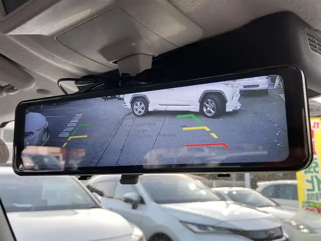 スズキ ジムニー ノマド FC 愛知県 2025(令7)年 0.1万km アークティックホワイトパール ワンオーナー/ディスプレイオーディオ/（Bluetooth、AppleCarPlay、AndroidAuto)/バックカメラ/デジタルインナーミラー/（ドライブレコーダー機能付き）/4WD/アイドリングストップ/横滑り防止装置/レーンキープアシスト/衝突被害軽減システム/追従式クルーズコントロール/シートヒータ/ウィンカーミラー/背面タイヤ/革調シートカバー/プッシュスタート/スマートキー/スペアキー/フロアマット