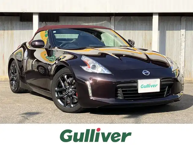 日産 フェアレディ Ｚ ロードスター バージョンST 三重県 2014(平26)年 11.3万km プレミアムディープマルーン ♪ワンオーナー/♪BOSEサウンド/インテリキー×2/プッシュスタート/純正HDDナビ/・DTV・CD録音/・DVD再生/・Bluetoothオーディオ/・バックカメラ/コーナーセンサー/ドライブレコーダー/ハーフレザーシート/D/N席パワーシート/D/N席エアシート/D/N席シートヒーター/純正18インチAW/HIDヘッドライト/リアフォグライト /オートライト/電格ミラー/革巻ステアリング/ステアリングスイッチ/パドルシフト/ビルトインETC/フロアマット