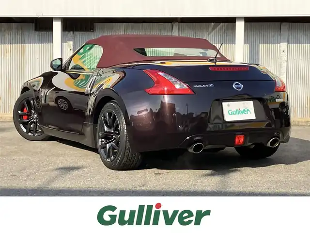 日産 フェアレディ Ｚ ロードスター バージョンST 三重県 2014(平26)年 11.3万km プレミアムディープマルーン ♪ワンオーナー/♪BOSEサウンド/インテリキー×2/プッシュスタート/純正HDDナビ/・DTV・CD録音/・DVD再生/・Bluetoothオーディオ/・バックカメラ/コーナーセンサー/ドライブレコーダー/ハーフレザーシート/D/N席パワーシート/D/N席エアシート/D/N席シートヒーター/純正18インチAW/HIDヘッドライト/リアフォグライト /オートライト/電格ミラー/革巻ステアリング/ステアリングスイッチ/パドルシフト/ビルトインETC/フロアマット