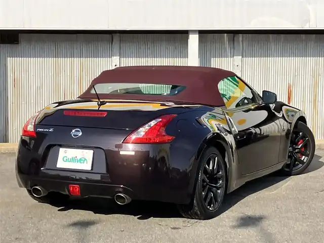 日産 フェアレディ Ｚ ロードスター バージョンST 三重県 2014(平26)年 11.3万km プレミアムディープマルーン ♪ワンオーナー/♪BOSEサウンド/インテリキー×2/プッシュスタート/純正HDDナビ/・DTV・CD録音/・DVD再生/・Bluetoothオーディオ/・バックカメラ/コーナーセンサー/ドライブレコーダー/ハーフレザーシート/D/N席パワーシート/D/N席エアシート/D/N席シートヒーター/純正18インチAW/HIDヘッドライト/リアフォグライト /オートライト/電格ミラー/革巻ステアリング/ステアリングスイッチ/パドルシフト/ビルトインETC/フロアマット