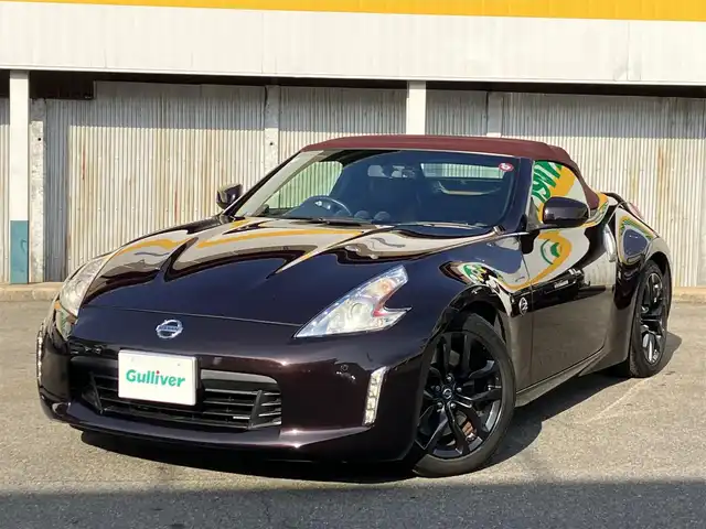 日産 フェアレディ Ｚ ロードスター バージョンST 三重県 2014(平26)年 11.3万km プレミアムディープマルーン ♪ワンオーナー/♪BOSEサウンド/インテリキー×2/プッシュスタート/純正HDDナビ/・DTV・CD録音/・DVD再生/・Bluetoothオーディオ/・バックカメラ/コーナーセンサー/ドライブレコーダー/ハーフレザーシート/D/N席パワーシート/D/N席エアシート/D/N席シートヒーター/純正18インチAW/HIDヘッドライト/リアフォグライト /オートライト/電格ミラー/革巻ステアリング/ステアリングスイッチ/パドルシフト/ビルトインETC/フロアマット