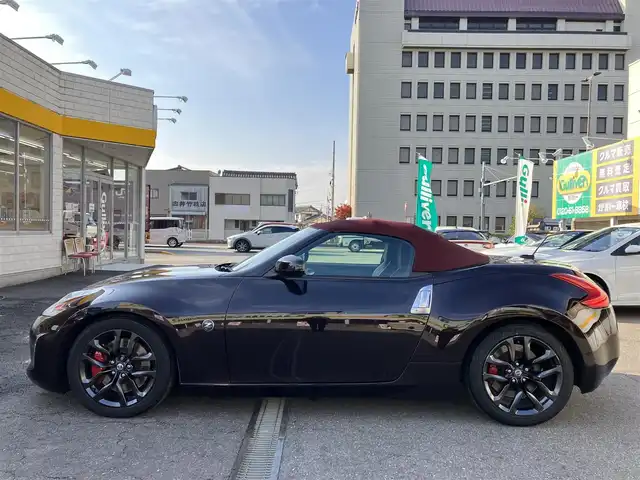日産 フェアレディ Ｚ ロードスター バージョンST 三重県 2014(平26)年 11.3万km プレミアムディープマルーン ♪ワンオーナー/♪BOSEサウンド/インテリキー×2/プッシュスタート/純正HDDナビ/・DTV・CD録音/・DVD再生/・Bluetoothオーディオ/・バックカメラ/コーナーセンサー/ドライブレコーダー/ハーフレザーシート/D/N席パワーシート/D/N席エアシート/D/N席シートヒーター/純正18インチAW/HIDヘッドライト/リアフォグライト /オートライト/電格ミラー/革巻ステアリング/ステアリングスイッチ/パドルシフト/ビルトインETC/フロアマット