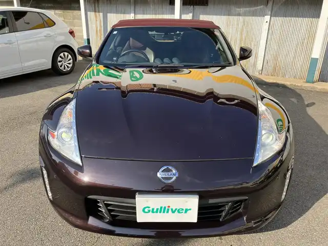 日産 フェアレディ Ｚ ロードスター バージョンST 三重県 2014(平26)年 11.3万km プレミアムディープマルーン ♪ワンオーナー/♪BOSEサウンド/インテリキー×2/プッシュスタート/純正HDDナビ/・DTV・CD録音/・DVD再生/・Bluetoothオーディオ/・バックカメラ/コーナーセンサー/ドライブレコーダー/ハーフレザーシート/D/N席パワーシート/D/N席エアシート/D/N席シートヒーター/純正18インチAW/HIDヘッドライト/リアフォグライト /オートライト/電格ミラー/革巻ステアリング/ステアリングスイッチ/パドルシフト/ビルトインETC/フロアマット