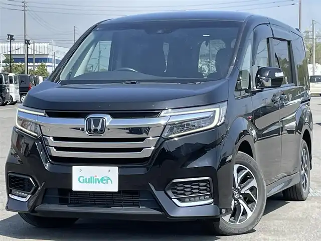 ホンダ ステップワゴン スパーダ ホンダセンシング 道央・札幌 2020(令2)年 8万km プレミアムスパークルブラックパール ４WD/純正ディーラーOPナビ/CD/DVD/BT/フルセグ/ホンダセンシング/衝突被害軽減ブレーキ/横滑り防止装置/アダプティブクルーズコントロール/レーンキープアシスト/バックカメラ/ビルトインETC2.0/アイドリングストップ/ECONモード/ワイパーデアイサー/両側パワースライドドア/革巻きステアリング/ステアリングリモコン/パドルシフト/プッシュスタート/スマートキー/LEDヘッドライト/オートライト/フォグランプ/電動格納ミラー/ウィンカーミラー/純正フロアマット/ドアバイザー