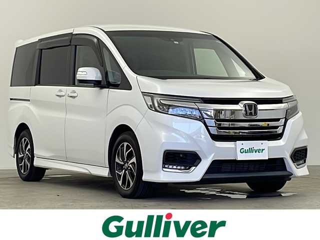 ホンダ ステップワゴン スパーダ ホンダセンシング 千葉県 2019(令1)年 6.1万km プラチナホワイトパール ホンダセンシング/　・衝突軽減ブレーキ〈CMBS〉/　・誤発進抑制機能/　・歩行者事故低減ステアリング/　・路外逸脱抑制機能/　・アダプティブ・クルーズ・コントロール/　・車線維持支援システム/　・先行車発進お知らせ機能/　・標識認識機能/純正フリップダウンモニター/純正9インチメモリナビ/　CD/DVD/BT/フルセグTV/ビルトインETC/バックカメラ/パドルシフト/LEDヘッドライト/純正16インチアルミホイール