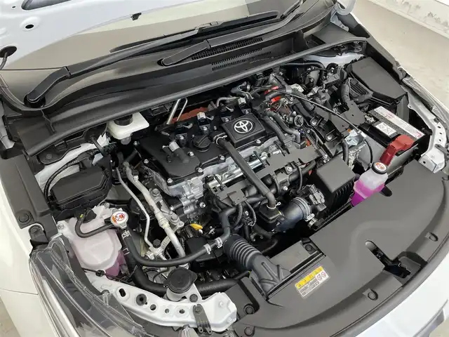 トヨタ カローラ ハイブリット ダブルバイビー 滋賀県 2024(令6)年 1.3万km プラチナホワイトパールマイカ 禁煙車/純正８インチナビ/（Bluetooth・フルセグTV・USB・Miracast)/バックカメラ/トヨタセーフティセンス/-プリクラッシュセーフティ/-レーダークルーズコントロール/-レーントレーシングアシスト/-レーンディパーチャーアラート/-オートマチックハイビーム/-ロードサインアシスト/コーナーセンサー/ビルトインETC2.0/革巻きステアリング/ステアリングスイッチ/ステアリングヒーター/充電用USB端子/電動パーキングスイッチ/LEDヘッドライト/スマートキー/プッシュスタート
