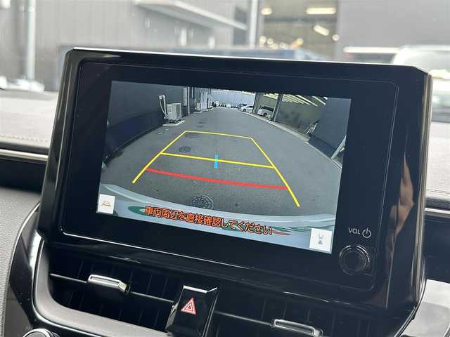 トヨタ カローラ ハイブリット ダブルバイビー 滋賀県 2024(令6)年 1.3万km プラチナホワイトパールマイカ 禁煙車/純正８インチナビ/（Bluetooth・フルセグTV・USB・Miracast)/バックカメラ/トヨタセーフティセンス/-プリクラッシュセーフティ/-レーダークルーズコントロール/-レーントレーシングアシスト/-レーンディパーチャーアラート/-オートマチックハイビーム/-ロードサインアシスト/コーナーセンサー/ビルトインETC2.0/革巻きステアリング/ステアリングスイッチ/ステアリングヒーター/充電用USB端子/電動パーキングスイッチ/LEDヘッドライト/スマートキー/プッシュスタート