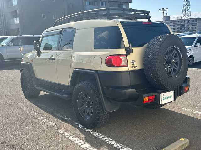 トヨタ ＦＪクルーザー ファイナルエディション 石川県 2017(平29)年 5.4万km ベージュ 社外ＳＤナビ/フルセグ/Bluetooth/DVD再生/４ＷＤ/デフロック/革調シートカバー/社外アルミホイール/革巻きステアリング/バックカメラ/ＬＥＤヘッドライト/クルーズコントロール/コーナーセンサー/ルーフラック/背面タイヤ/スペアキー有