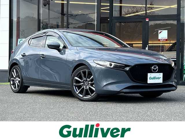 マツダ マツダ３ファストバック XD Lパッケージ 大阪府 2019(令1)年 7.6万km ポリメタルグレーM ＢＯＳＥ　衝突軽減　全方位カメラ　レーダークルーズコントロール　フルセグＴＶ　ＣＤ　ＤＶＤ　ＨＤＭＩ　Ｂｌｕｅｔｏｏｔｈ　ＨＵＤ　ＢＳＭ　置くだけ充電　レザーシート　パワーシート　シートヒーター　ハンドルヒーター　ドラレコ　ＥＴＣ　純正フロアマット　純正ホイール　スマートキー