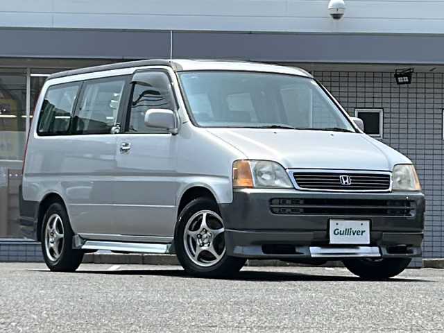 ホンダ ステップワゴン G 愛知県 1998(平10)年 14.1万km ニューボーグシルバーメタリック /禁煙ワンオーナー//純正エアロ(フロント/サイド/リア)//モデューロ15インチアルミ//Wサンルーフ//社外HDDナビ(パナソニック　CN-HW850D)//フルセグTV/HDD/CD/DVD/AM/FM//ETC//純正キーレスエントリーシステム//スペアキー//純正フロアマット//ワイドドアバイザー//電動格納ミラー//シガーライター//WAC//スライドドア//後席カーテン//3列シート//保証書//取扱説明書