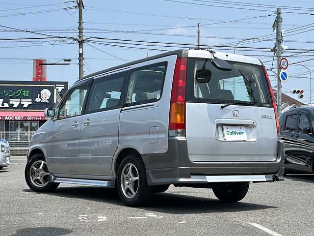 ホンダ ステップワゴン G 愛知県 1998(平10)年 14.1万km ニューボーグシルバーメタリック /禁煙ワンオーナー//純正エアロ(フロント/サイド/リア)//モデューロ15インチアルミ//Wサンルーフ//社外HDDナビ(パナソニック　CN-HW850D)//フルセグTV/HDD/CD/DVD/AM/FM//ETC//純正キーレスエントリーシステム//スペアキー//純正フロアマット//ワイドドアバイザー//電動格納ミラー//シガーライター//WAC//スライドドア//後席カーテン//3列シート//保証書//取扱説明書