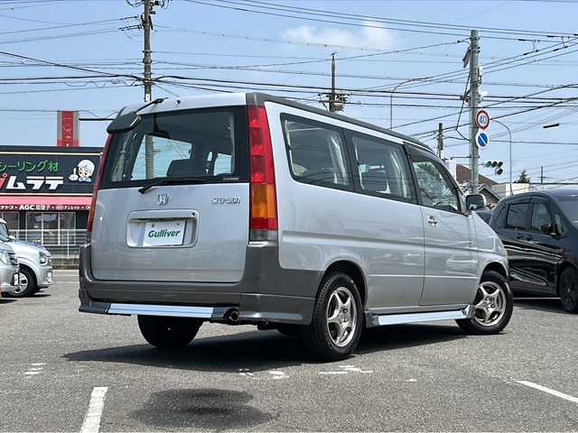 ホンダ ステップワゴン G 愛知県 1998(平10)年 14.1万km ニューボーグシルバーメタリック /禁煙ワンオーナー//純正エアロ(フロント/サイド/リア)//モデューロ15インチアルミ//Wサンルーフ//社外HDDナビ(パナソニック　CN-HW850D)//フルセグTV/HDD/CD/DVD/AM/FM//ETC//純正キーレスエントリーシステム//スペアキー//純正フロアマット//ワイドドアバイザー//電動格納ミラー//シガーライター//WAC//スライドドア//後席カーテン//3列シート//保証書//取扱説明書