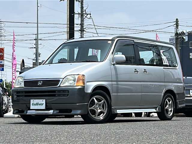 ホンダ ステップワゴン G 愛知県 1998(平10)年 14.1万km ニューボーグシルバーメタリック /禁煙ワンオーナー//純正エアロ(フロント/サイド/リア)//モデューロ15インチアルミ//Wサンルーフ//社外HDDナビ(パナソニック　CN-HW850D)//フルセグTV/HDD/CD/DVD/AM/FM//ETC//純正キーレスエントリーシステム//スペアキー//純正フロアマット//ワイドドアバイザー//電動格納ミラー//シガーライター//WAC//スライドドア//後席カーテン//3列シート//保証書//取扱説明書