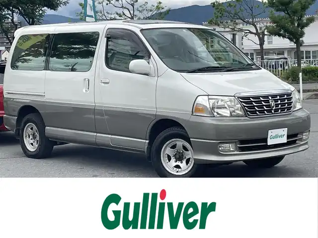 トヨタ グランド ハイエース G Xエディション 長野県 2000(平12)年 3.7万km ベージュ 社外ナビ（FM/AM、CD、DVD、BT、USB）/バックカメラ/ワンセグテレビ/社外ETC/サンルーフ/ダブルエアバック/純正フロアマット/三列目シート/ハロゲンヘッドライト/ABS/社外１５AW/電動カーテン