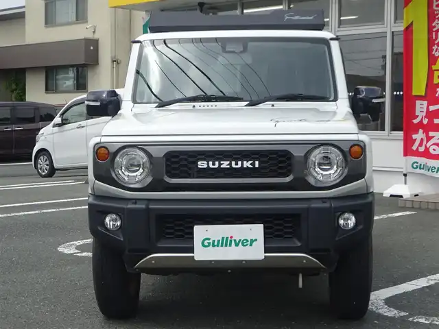 スズキ ジムニー XC 静岡県 2021(令3)年 4.8万km ピュアホワイトP ワンオーナー/禁煙車/クルーズコントロール/純正ラバーマット/ルーフキャリア/前席シートヒーター/KENWOOD CDオーディオ/ステアリングリモコン/セーフティサポート/・デュアルセンサーブレーキサポート/・誤発進抑制機能/・車線逸脱警報機能/・ふらつき警報機能/・先行車発進お知らせ機能/・標識認識機能/・ハイビームアシスト/LEDヘッドライト/オートライト/プッシュスタート・スマートキー/保証書・取扱説明書
