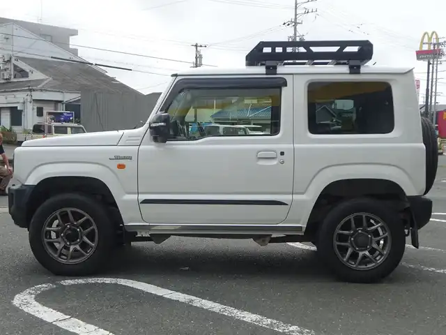 スズキ ジムニー XC 静岡県 2021(令3)年 4.8万km ピュアホワイトP ワンオーナー/禁煙車/クルーズコントロール/純正ラバーマット/ルーフキャリア/前席シートヒーター/KENWOOD CDオーディオ/ステアリングリモコン/セーフティサポート/・デュアルセンサーブレーキサポート/・誤発進抑制機能/・車線逸脱警報機能/・ふらつき警報機能/・先行車発進お知らせ機能/・標識認識機能/・ハイビームアシスト/LEDヘッドライト/オートライト/プッシュスタート・スマートキー/保証書・取扱説明書