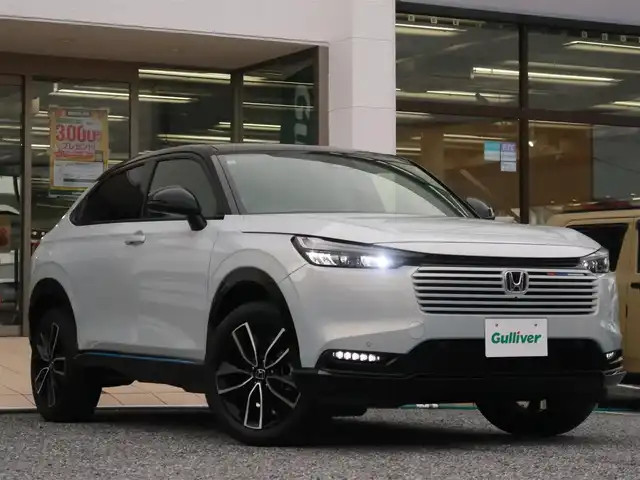 ホンダ ヴェゼル ハイブリッド e:HEV Z PLaYパッケージ 千葉県 2024(令6)年 0.9万km プレミアムサンライトホワイトパール パノラマルーフ/ホンダコネクトディスプレイ/ナビゲーション/フルセグTV/Bluetooth/AM/FM/USB/マルチビューカメラ/ホンダセンシング/BSI/ブラインドスポットインフォメーション/ハンズフリーアクセスパワーテールゲート/シートヒーター/ステアリングヒーター/ビルトインETC2.0/ハーフレザー/プレミアムオーディオ/純正18インチAW/レーダークルーズコントロール/パドルシフト/ワイヤレス充電/LEDヘッドライト/LEDフォグランプ/USB充電/スマートキー×2本/取説/保証書