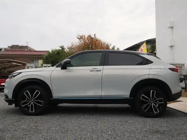 ホンダ ヴェゼル ハイブリッド e:HEV Z PLaYパッケージ 千葉県 2024(令6)年 0.9万km プレミアムサンライトホワイトパール パノラマルーフ/ホンダコネクトディスプレイ/ナビゲーション/フルセグTV/Bluetooth/AM/FM/USB/マルチビューカメラ/ホンダセンシング/BSI/ブラインドスポットインフォメーション/ハンズフリーアクセスパワーテールゲート/シートヒーター/ステアリングヒーター/ビルトインETC2.0/ハーフレザー/プレミアムオーディオ/純正18インチAW/レーダークルーズコントロール/パドルシフト/ワイヤレス充電/LEDヘッドライト/LEDフォグランプ/USB充電/スマートキー×2本/取説/保証書