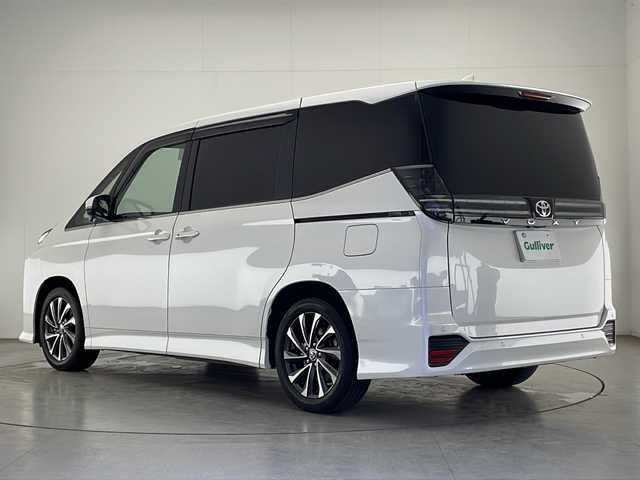 トヨタ ヴォクシー S－Z 宮崎県 2024(令6)年 2.1万km ホワイトパールクリスタルシャイン 禁煙車/トヨタセーフティセンス/純正10.5型ディスプレイオーディオナビTV/（T-CONNECT/Bluetooth/CD/DVD/フルセグTV)/純正14.1型リアフリップダウンモニター/（V14T-R72R）/純正ビルトイン2.0ETC/純正LEDオートライト/純正18インチアルミ/純正フロアマット/両側電動スライドドア/パワーバックドア/プリクラッシュセーフティ/アダプティブクルーズコントロール/レーンディパーチャーアラート/オートマチックハイビーム/電子パーキング/オートホールド/ハーフレザーシート/シートヒーター/Wオートエアコン（ナノイーX）/本革巻ハンドル/ウインカードアミラー/スマートキー/プッシュエンジンスタート/新車時保証書/取扱い説明書