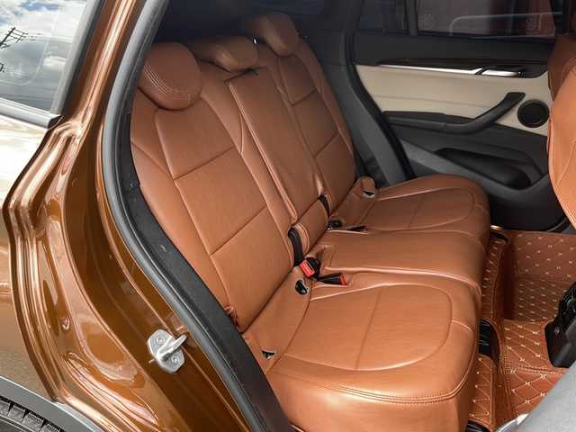 ＢＭＷ Ｘ１ xDrive 20i 山形県 2015(平27)年 5.6万km 茶 禁煙車/４WD/純正ナビ（CD.DVD.Bluetooth.AUX）/バックカメラ/アイドリングストップ/ヒートシーター/サンルーフ/スマートキー/横滑り防止装置/コーナーセンサー/ABS/エアバッグWサイド