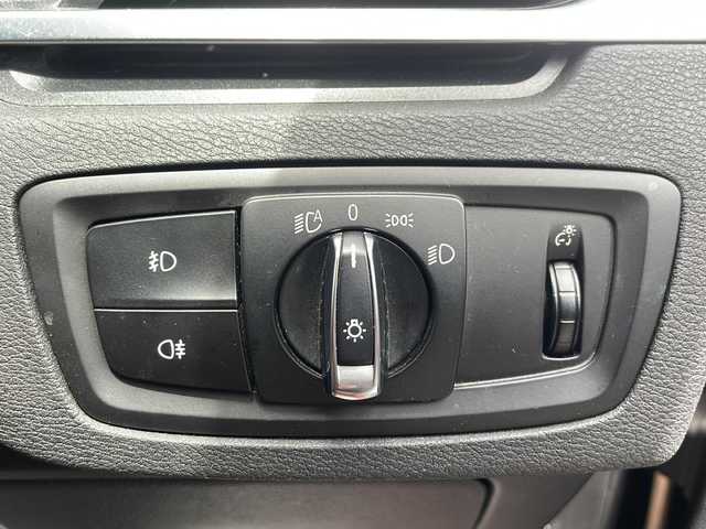 ＢＭＷ Ｘ１ xDrive 20i 山形県 2015(平27)年 5.6万km 茶 禁煙車/４WD/純正ナビ（CD.DVD.Bluetooth.AUX）/バックカメラ/アイドリングストップ/ヒートシーター/サンルーフ/スマートキー/横滑り防止装置/コーナーセンサー/ABS/エアバッグWサイド