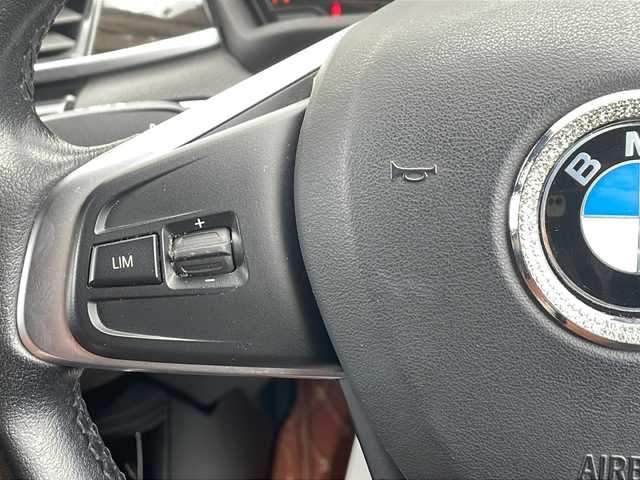 ＢＭＷ Ｘ１ xDrive 20i 山形県 2015(平27)年 5.6万km 茶 禁煙車/４WD/純正ナビ（CD.DVD.Bluetooth.AUX）/バックカメラ/アイドリングストップ/ヒートシーター/サンルーフ/スマートキー/横滑り防止装置/コーナーセンサー/ABS/エアバッグWサイド