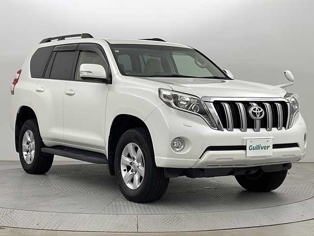 トヨタ ランドクルーザー プラド TX 新潟県 2017(平29)年 2.6万km ホワイトパールクリスタルシャイン 4WD/サンルーフ/社外ナビ/　　フルセグ/CD/DVD/BT/LEDオートライト/純正17インチアルミホイール/ウィンカーミラー/電格ミラー/スマートキー/ETC