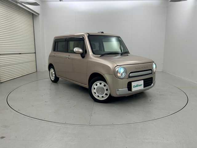スズキ ラパン ショコラ X 茨城県 2015(平27)年 2万km シャンパンピンクPM パワーステアリング/スマートキー/Bluetooth接続/社外ナビ/フルセグ視聴可/純正フロアマット/合皮シート/ABS