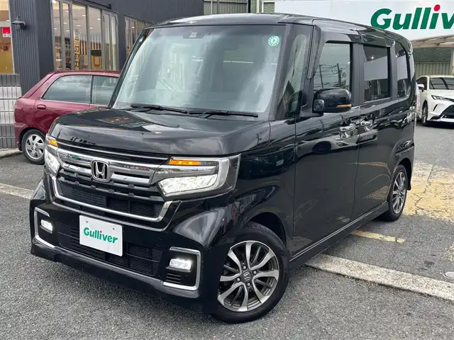 ホンダ Ｎ ＢＯＸ カスタム L 京都府 2021(令3)年 5.8万km クリスタルブラックパール ・7インチSDナビ(CN-E300D)/　ワンセグ/　バックカメラ/　CD再生/　Bluetooth/・USBポート/・ステアリングスイッチ/・クルコン/・パーキングセンサー/・横滑り防止機能/・車線逸脱警告/・衝突軽減システム/・ECONモード/・片側パワースライドドア/・純正14インチAW/・純正マット/・純正バイザー/・ETC/・取説/保証書/・スペアキー