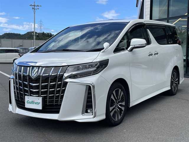 トヨタ アルファード S Cパッケージ 愛媛県 2021(令3)年 7.3万km ホワイトパールクリスタルシャイン プリクラッシュセーフティ/レーダークルーズコントロール/レーントレーシングアシスト/クリアランスソナー /ロードサインアシスト/PKSB/Wサンルーフ/純正8インチディスプレイオーディオ/　CD/DVD/Bluetooth/フルセグTV/フリップダウンモニター/バックカメラ/ビルトインETC/黒革シート/前席パワーシート/シートヒーター/シートベンチレーション/パワーバックドア/両側パワースライドドア/パワーバックドア/プッシュスタート/オートライト/三眼LEDヘッドライト/フロアマット