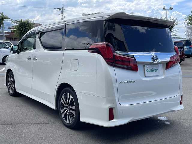 トヨタ アルファード S Cパッケージ 愛媛県 2021(令3)年 7.3万km ホワイトパールクリスタルシャイン プリクラッシュセーフティ/レーダークルーズコントロール/レーントレーシングアシスト/クリアランスソナー /ロードサインアシスト/PKSB/Wサンルーフ/純正8インチディスプレイオーディオ/　CD/DVD/Bluetooth/フルセグTV/フリップダウンモニター/バックカメラ/ビルトインETC/黒革シート/前席パワーシート/シートヒーター/シートベンチレーション/パワーバックドア/両側パワースライドドア/パワーバックドア/プッシュスタート/オートライト/三眼LEDヘッドライト/フロアマット