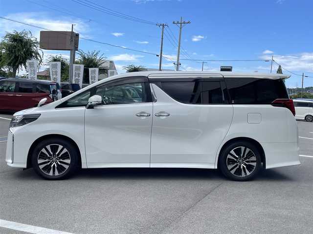 トヨタ アルファード S Cパッケージ 愛媛県 2021(令3)年 7.3万km ホワイトパールクリスタルシャイン プリクラッシュセーフティ/レーダークルーズコントロール/レーントレーシングアシスト/クリアランスソナー /ロードサインアシスト/PKSB/Wサンルーフ/純正8インチディスプレイオーディオ/　CD/DVD/Bluetooth/フルセグTV/フリップダウンモニター/バックカメラ/ビルトインETC/黒革シート/前席パワーシート/シートヒーター/シートベンチレーション/パワーバックドア/両側パワースライドドア/パワーバックドア/プッシュスタート/オートライト/三眼LEDヘッドライト/フロアマット