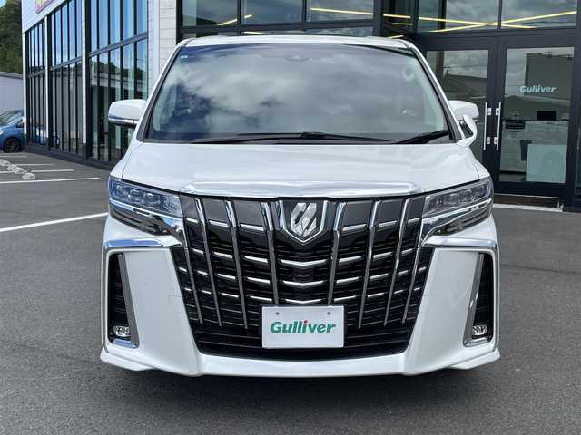 トヨタ アルファード S Cパッケージ 愛媛県 2021(令3)年 7.3万km ホワイトパールクリスタルシャイン プリクラッシュセーフティ/レーダークルーズコントロール/レーントレーシングアシスト/クリアランスソナー /ロードサインアシスト/PKSB/Wサンルーフ/純正8インチディスプレイオーディオ/　CD/DVD/Bluetooth/フルセグTV/フリップダウンモニター/バックカメラ/ビルトインETC/黒革シート/前席パワーシート/シートヒーター/シートベンチレーション/パワーバックドア/両側パワースライドドア/パワーバックドア/プッシュスタート/オートライト/三眼LEDヘッドライト/フロアマット
