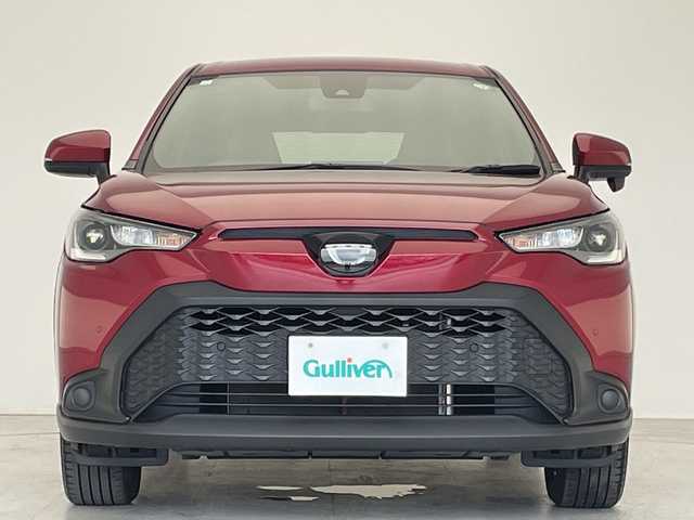 トヨタ カローラ クロス G 愛知県 2023(令5)年 2.4万km センシュアルレッドマイカ 純正ディズプレイオーディオ　ナビ機能なし/バックカメラ/アップルカープレイ/衝突軽減システム/レーダークルーズコントロール/オートホールド/本革ステアリング/LEDヘッドライト/ステアリングスイッチ/スマートキー/プッシュスタート