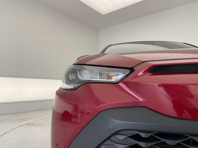 トヨタ カローラ クロス G 愛知県 2023(令5)年 2.4万km センシュアルレッドマイカ 純正ディズプレイオーディオ　ナビ機能なし/バックカメラ/アップルカープレイ/衝突軽減システム/レーダークルーズコントロール/オートホールド/本革ステアリング/LEDヘッドライト/ステアリングスイッチ/スマートキー/プッシュスタート