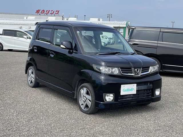 ホンダ ゼスト スパーク Wターボ 新潟県 2009(平21)年 11万km クエーサーグレーパール 純正ナビCD/DVD/HIDヘッドライト/4WD/純正フロアマット/純正14インチアルミホイール/ETC/スマートキー