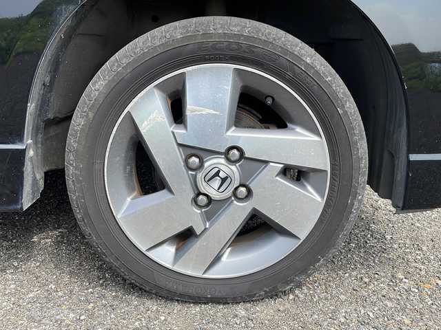 ホンダ ゼスト スパーク Wターボ 新潟県 2009(平21)年 11万km クエーサーグレーパール 純正ナビCD/DVD/HIDヘッドライト/4WD/純正フロアマット/純正14インチアルミホイール/ETC/スマートキー