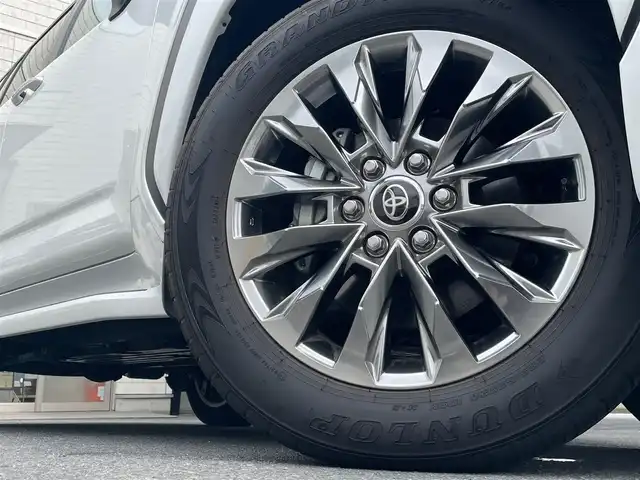 トヨタ ランドクルーザー ZX 東京都 2023(令5)年 1.5万km プレシャスホワイトパール 純正メモリーナビ/　フルセグTV　BT　CD/DVD　AM/FM　USB/　SD　HDMI/AppleCatPlay/AndoroidAuto/パワーバックドア/全方位カメラ/電動サンルーフ/ETC2.0/前後ドライブレコーダー/トヨタセーフティセンス/木目調革巻きステアリング/　ステアリングヒーター/ベージュ本革シート/　前席パワーシート/　前席/2列目ベンチレーション付快適温熱シート/　3列目電動格納シート/モデリスタエアロ/純正20インチアルミホイール/JBLサウンドシステム/100V電源/クールボックス/盗難防止装置Panthera/リアシートエンターテインメントシステム/左右後席独立温度調整オートエアコン/レーザークルーズコントロール/ルーフレール/保証書＆取扱説明書