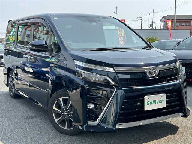 トヨタ ヴォクシー ZS 煌Ⅱ 奈良県 2020(令2)年 6.8万km ブラッキッシュアゲハガラスフレーク ワンオーナー/純正メーカーナビ/BT/TV/USB/SD//パワースライドドア/ビルドインETC/フルセグTV/両側パワースライド/オートライト（LED）/レザーシート/3列シート/スタットレスタイヤ積み込み/クルーズコントロール/プッシュスタート/保証書