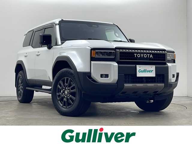 トヨタ ランドクルーザー ２５０ VX 秋田県 2024(令6)年 0.1万km プラチナホワイトパールマイカ ４WD/純正ナビ(Bluetooth/フルセグ/ACP/AA)/全方位カメラ/ステアリングヒーター/ビルトインETC/前席シートヒーター/前席エアシート/純正前後ドライブレコーダー/デジタルインナーミラー/パワーバックドア/運転席パワーシート/JBL/センターデフロック/オートマチックハイビーム/レザーシート/サンルーフ/純正AW/純正エンジンスターター/スマートキー