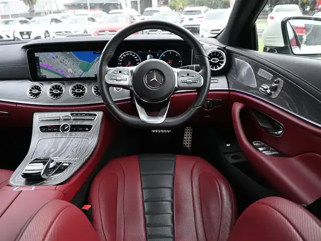 メルセデス・ベンツ ＣＬＳ２２０ｄ スポーツ エクスクルーシブPKG 千葉県 2019(平31)年 1.2万km ダイヤモンドホワイト 245/40R19/アクティブブレーキアシスト/レーンチェンジアシスト/ブラインドスポットアシスト/アテンションアシスト/ディストロニック/パノラミックスライディングルーフ/パワートランクリッド/赤/黒コンビレザーシート/前席パワーシート/エアシート/シートヒーター/純正ナビ/地デジTV/【Bluetooth接続】/【Apple CarPlay　Android Auto対応】/360°カメラ/ブルメスター/パフュームアトマイザー/革巻きステアリング/ステアリングスイッチ/パドルシフト/ETC（DSRC）/LEDヘッドライト/フォグライト/ウインカーミラー/パークトロニック/純正19インチアルミホイル/サイド/カーテンエアバッグ/キーレスゴー