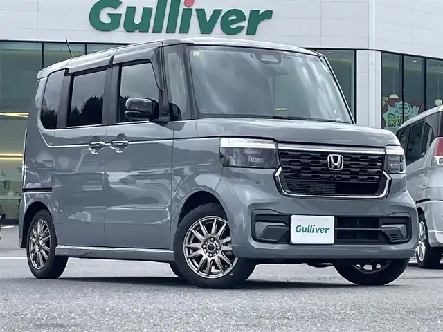 ホンダ Ｎ ＢＯＸ カスタム ターボ コーディネートS 島根県 2023(令5)年 2.4万km グレー 登録時走行距離　23257km/ワンオーナー/保証書/取扱説明書/Honda SENSING/純正ナビ/（Bluetooth/AM/FM/USB/typeC/CD/DVD)/AppleCarPlay/Android Auto/フルセグテレビ/バックカメラ/追従型クルーズコントロール/レーンキープアシスト/両側パワースライドドア/ブレーキホールド/オートリトラミラー/シートヒーター（DN席）/グレーステッチ 本革巻ステアリングホイール/パドルシフト/踏み間違い衝突軽減システム/ETC2.0/ドライブレコーダー前後/カラーコード　NH-912PA