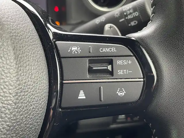 ホンダ Ｎ ＢＯＸ カスタム ターボ コーディネートS 島根県 2023(令5)年 2.4万km グレー 登録時走行距離　23257km/ワンオーナー/保証書/取扱説明書/Honda SENSING/純正ナビ/（Bluetooth/AM/FM/USB/typeC/CD/DVD)/AppleCarPlay/Android Auto/フルセグテレビ/バックカメラ/追従型クルーズコントロール/レーンキープアシスト/両側パワースライドドア/ブレーキホールド/オートリトラミラー/シートヒーター（DN席）/グレーステッチ 本革巻ステアリングホイール/パドルシフト/踏み間違い衝突軽減システム/ETC2.0/ドライブレコーダー前後/カラーコード　NH-912PA