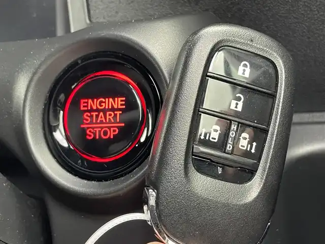 ホンダ Ｎ ＢＯＸ カスタム ターボ コーディネートS 島根県 2023(令5)年 2.4万km グレー 登録時走行距離　23257km/ワンオーナー/保証書/取扱説明書/Honda SENSING/純正ナビ/（Bluetooth/AM/FM/USB/typeC/CD/DVD)/AppleCarPlay/Android Auto/フルセグテレビ/バックカメラ/追従型クルーズコントロール/レーンキープアシスト/両側パワースライドドア/ブレーキホールド/オートリトラミラー/シートヒーター（DN席）/グレーステッチ 本革巻ステアリングホイール/パドルシフト/踏み間違い衝突軽減システム/ETC2.0/ドライブレコーダー前後/カラーコード　NH-912PA