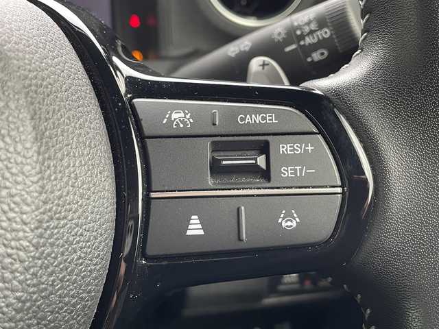 ホンダ Ｎ ＢＯＸ カスタム ターボ コーディネートS 島根県 2023(令5)年 2.4万km グレー 登録時走行距離　23257km/ワンオーナー/保証書/取扱説明書/Honda SENSING/純正ナビ/（Bluetooth/AM/FM/USB/typeC/CD/DVD)/AppleCarPlay/Android Auto/フルセグテレビ/バックカメラ/追従型クルーズコントロール/レーンキープアシスト/両側パワースライドドア/ブレーキホールド/オートリトラミラー/シートヒーター（DN席）/グレーステッチ 本革巻ステアリングホイール/パドルシフト/踏み間違い衝突軽減システム/ETC2.0/ドライブレコーダー前後/カラーコード　NH-912PA