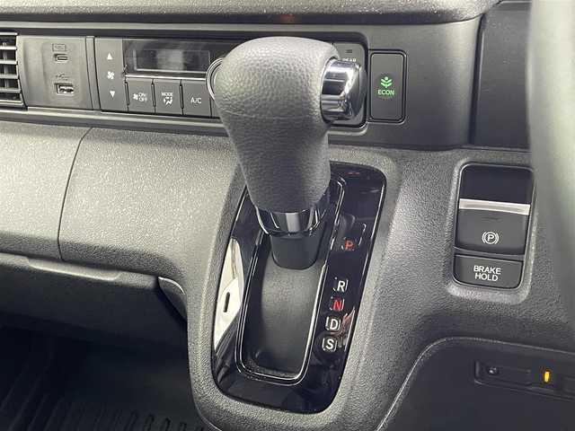 ホンダ Ｎ ＢＯＸ カスタム ターボ コーディネートS 島根県 2023(令5)年 2.4万km グレー 登録時走行距離　23257km/ワンオーナー/保証書/取扱説明書/Honda SENSING/純正ナビ/（Bluetooth/AM/FM/USB/typeC/CD/DVD)/AppleCarPlay/Android Auto/フルセグテレビ/バックカメラ/追従型クルーズコントロール/レーンキープアシスト/両側パワースライドドア/ブレーキホールド/オートリトラミラー/シートヒーター（DN席）/グレーステッチ 本革巻ステアリングホイール/パドルシフト/踏み間違い衝突軽減システム/ETC2.0/ドライブレコーダー前後/カラーコード　NH-912PA