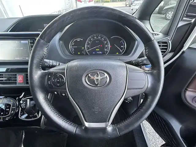 トヨタ エスクァイア ハイブリッド Gi 東京都 2015(平27)年 7.4万km ホワイトパールクリスタルシャイン ワンオーナー/メモリー純正ナビ/AM/FM/ワンセグ/BT/『NSCP-W64』/バックカメラ/セーフティセンスC/・プリクラッシュセーフティシステム/・レーンディパーチャーアラート/・オートマチックハイビーム/クルーズコントロール/置くだけ充電/両側パワースライドドア/DN席シートヒーター/ハンドル革巻きステアリング/ETC/スペアキー×1/合皮シート/保証書/取扱説明書