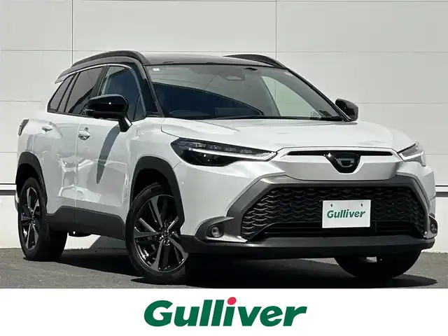トヨタ カローラ クロス ハイブリッド Z 佐賀県 2024(令6)年 1.3万km アティチュードブラックマイカ/プラチナホワイトパールマイカ トヨタセーフティセンス/・プリクラッシュセーフティ/・レーントレーシングアシスト/・レーダークルーズコントロール/・ロードサインアシスト/・プロアクティブドライビングアシスト/ブラインドスポットモニター/アラウンドビューモニター/前後コーナーセンサー/純正OPパノラマルーフ/パワーバックドア/LEDヘッドライト/フォグランプ/オートマチックハイビーム/純正ディスプレイオーディオ/・フルセグTV/BT/TypeC端子/ETC2.0